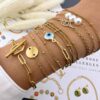 Gold paperclip chain bracelet with toggle clasp