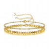 Layered gold bracelet set with polished beads and fine adjustable chains