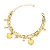 Gold layered bracelet with heart charms and small bead drops with adjustable extender