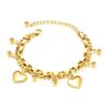 Gold layered bracelet with heart charms and small bead drops with adjustable extender