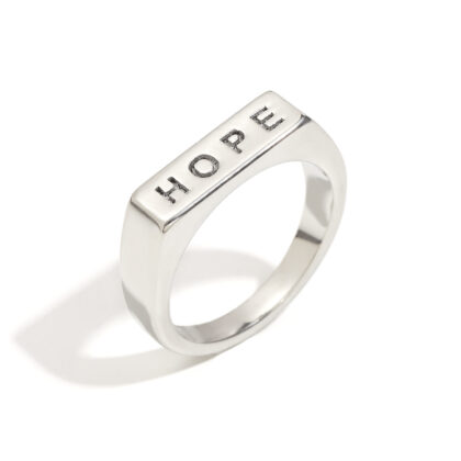 A clean silver signet ring engraved with HOPE. Minimal, timeless, and designed for everyday wear, perfect for modern ring layering.