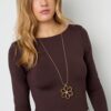 Elegant gold flower necklace with crystal center. A timeless floral pendant necklace perfect for everyday wear or special occasions. Lightweight, stylish, and ideal as a gift.