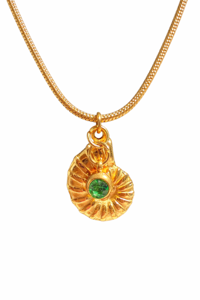 A one-of-a-kind gold-tone necklace with two charms: a shell and a green glass stone. Designed by the webshop owner and available as a single piece only.