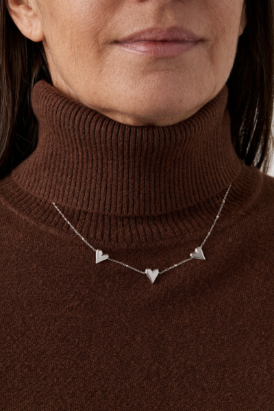 hearts Short silver stainless steel necklace 38 + 5 cm on brown turtleneck minimalist jewelry