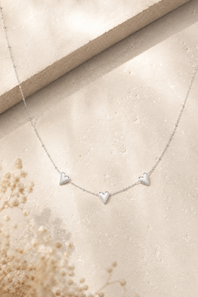 Silver Glow Necklace Heart silver necklace with three hearts