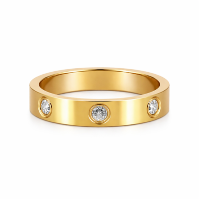 Minimal gold ring with three bezel-set diamonds, flat band design, product photo on white background