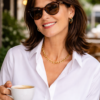 Sweet7 Gold Chain Necklace – Minimal Stainless Steel Everyday Chain (42–45 cm) Stylish woman with dark brown hair wearing a gold chain necklace, sitting at an outdoor café with a coffee
