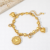 gold stainless steel heart charm bracelet with layered chains and sparkling detail adjustable length