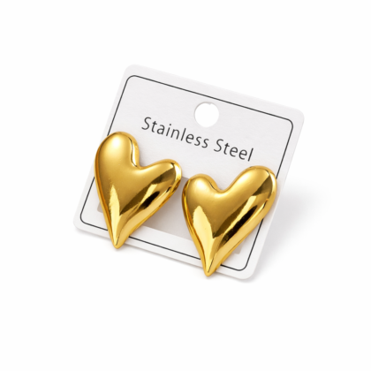 Gold stainless steel heart shaped statement earrings with shiny finish on white background