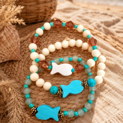 ChatGPT Image 20 mei 2026, 16_44_23 Set of 3 elastic bracelets with colorful acrylic beads and wooden fish charms in a beachy Ibiza style