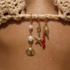 Marine-Style-Shell-Brooch-For-Women-In-Titanium-Steel-With-Electroplated-Gold-Finish (1) Pearl Shell Bikini Charm Gold
